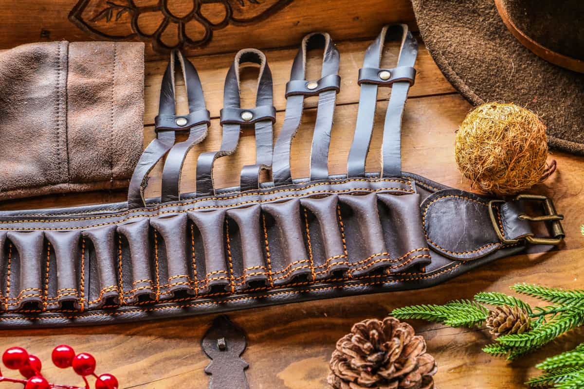 Warmly lit table of hunting gift items